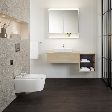 Ein Bad En-Suite mit einem Dusch-WC Geberit AquaClean Sela